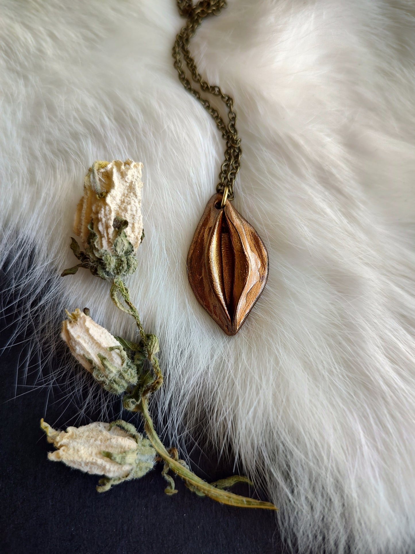 Small yoni necklace