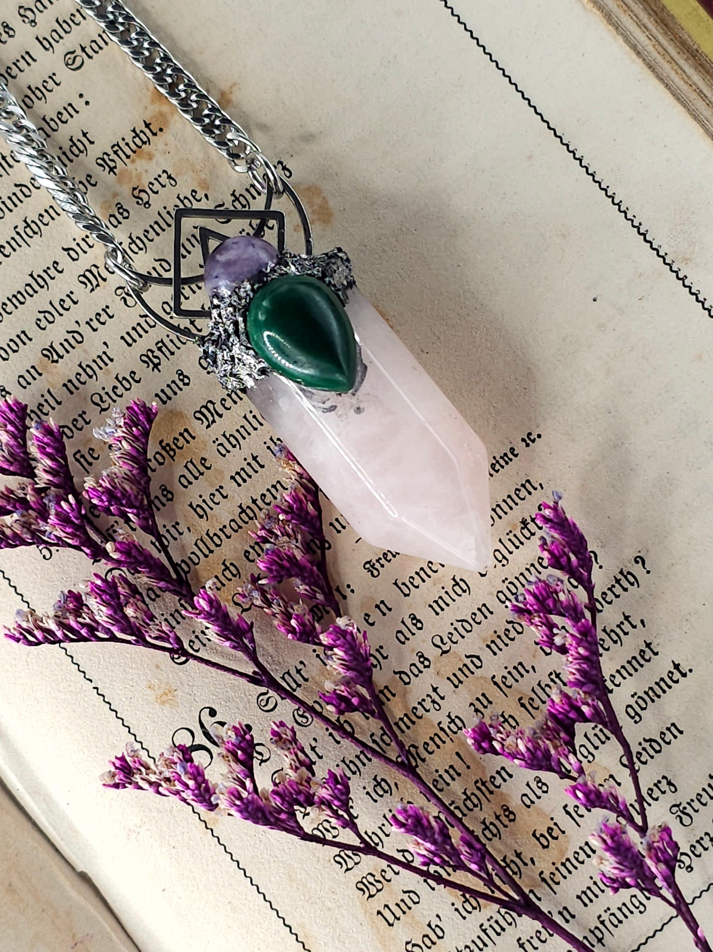 Geometric rose quartz amulet