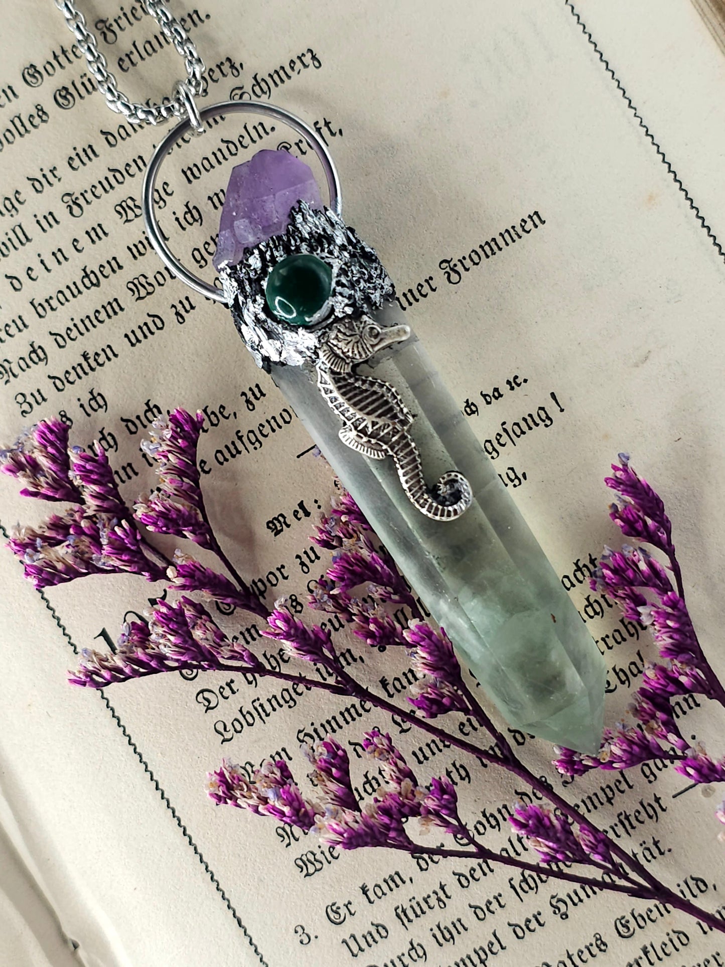 Fluorite seahorse amulet