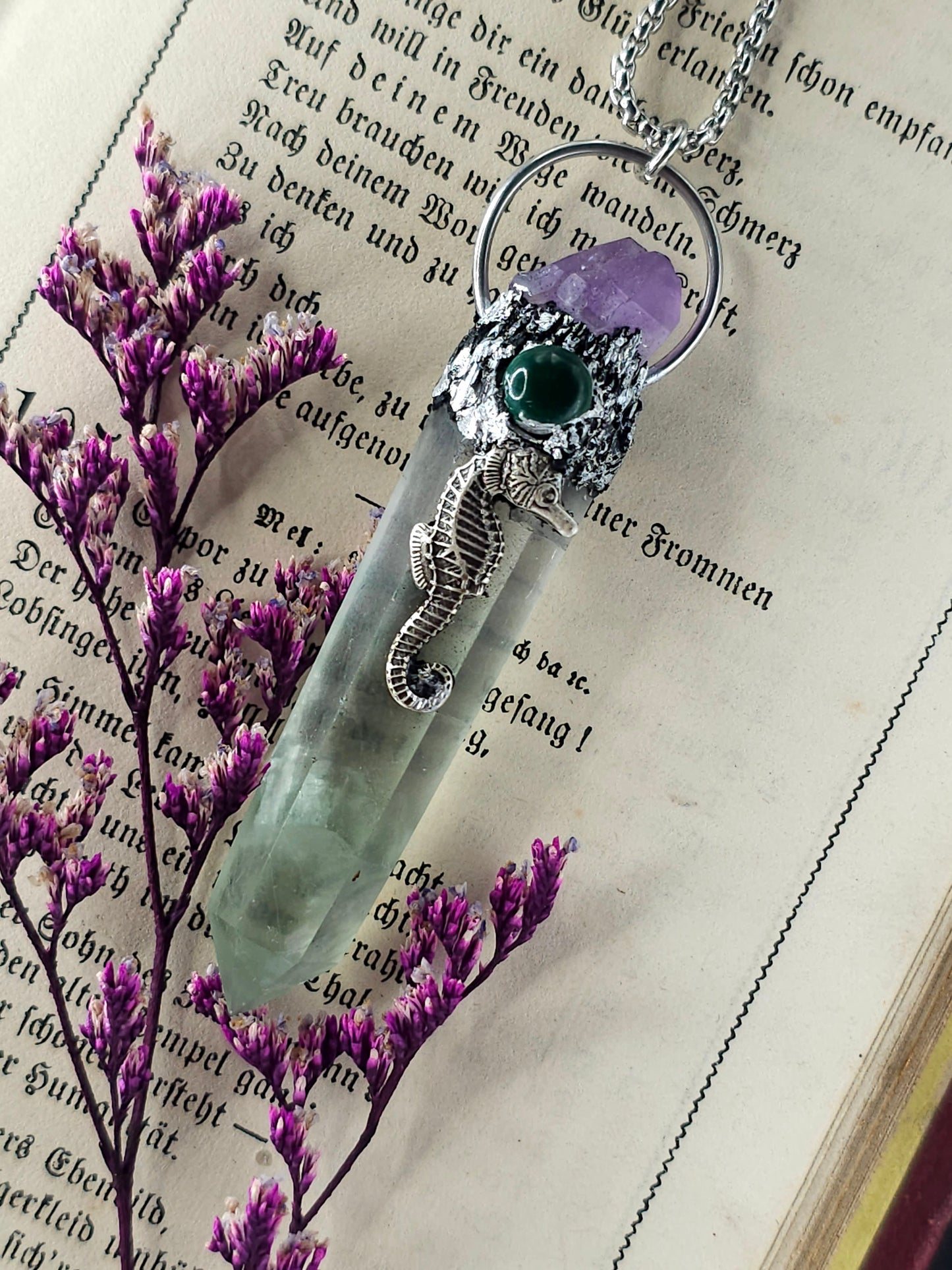 Fluorite seahorse amulet