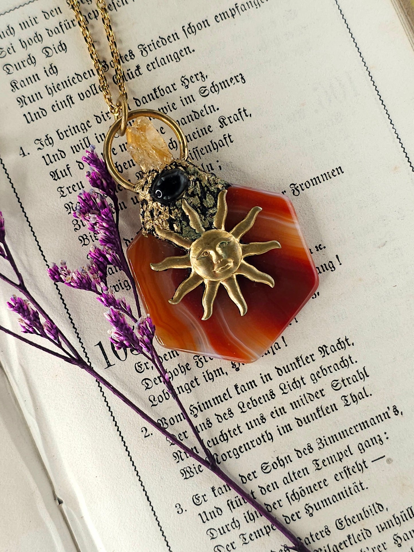 Red agate sun amulet