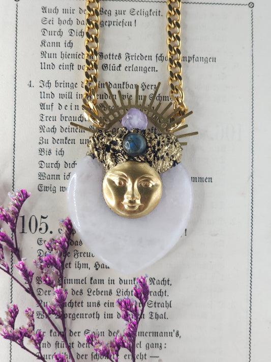 Rose quartz moonface amulet