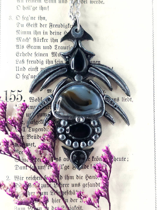 Obsidian tribal amulet